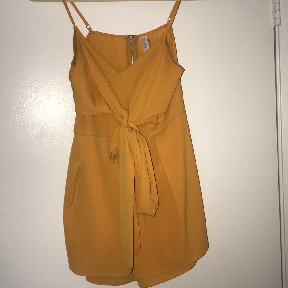 ⭐️MUSTARD TIE ROMPER⭐️